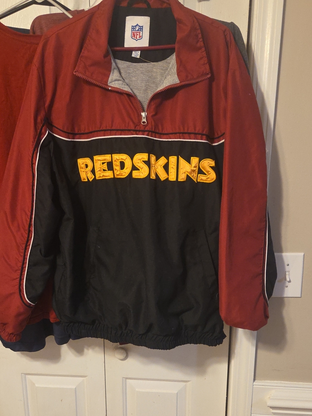 NFL Men's Burgundy and Black Redskins Pullover Jacket with Yellow Logo